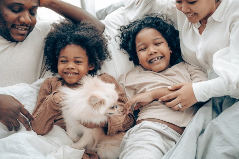 family with their dog