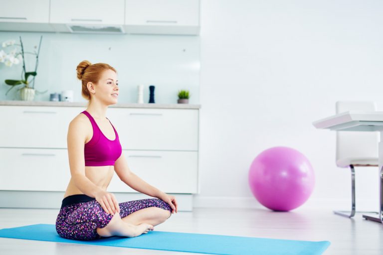 a woman doing yoga