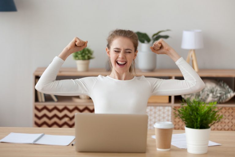 woman celebrating good work