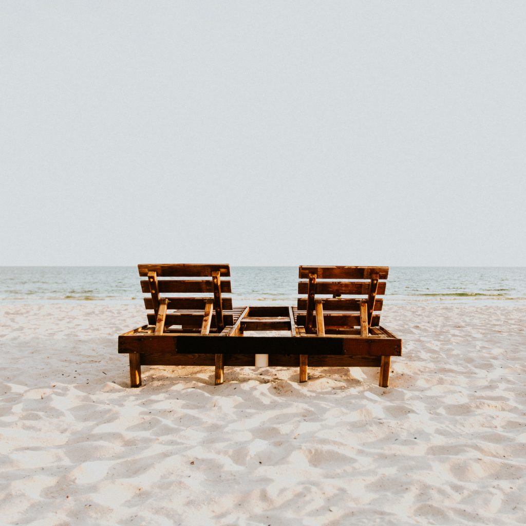 two seats by the beach