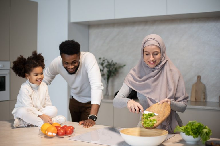 healthy family preparing healthy food in the kitchen